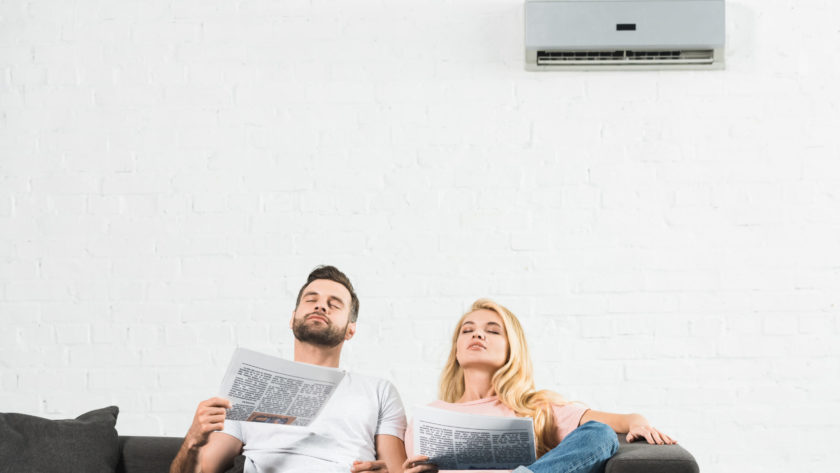 couple on couch with newspapers suffering from hea 2021 09 03 01 40 19 utc scaled