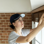 people installing window curtain 2021 08 27 00 04 13 utc scaled