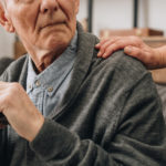 cropped view of sad pensioner with wife hands on s 2022 12 16 19 27 07 utc scaled