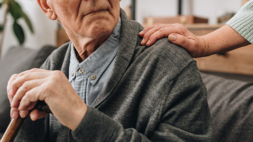 cropped view of sad pensioner with wife hands on s 2022 12 16 19 27 07 utc scaled