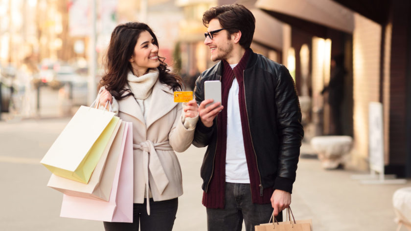 easy shopping happy couple using smartphone and c 2022 12 16 08 03 30 utc scaled