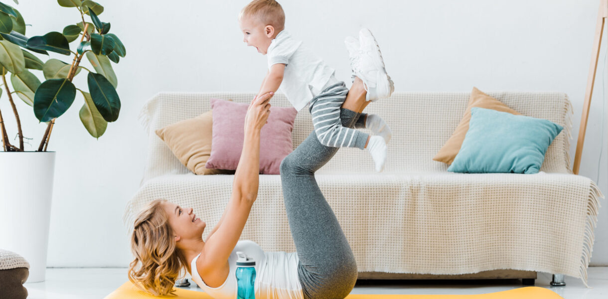 woman lying on fitness mat looking up and raising 2022 12 16 19 51 51 utc scaled