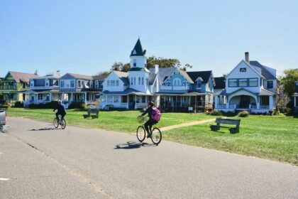 people riding their bikes in a neighborhood on mar 2022 11 16 17 52 25 utc scaled