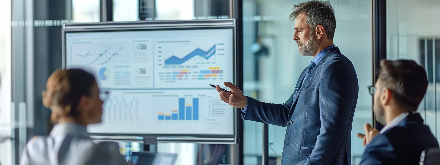 business professionals in a boardroom discussing data security and compliance measures for an erp system anchored on a whiteboard.