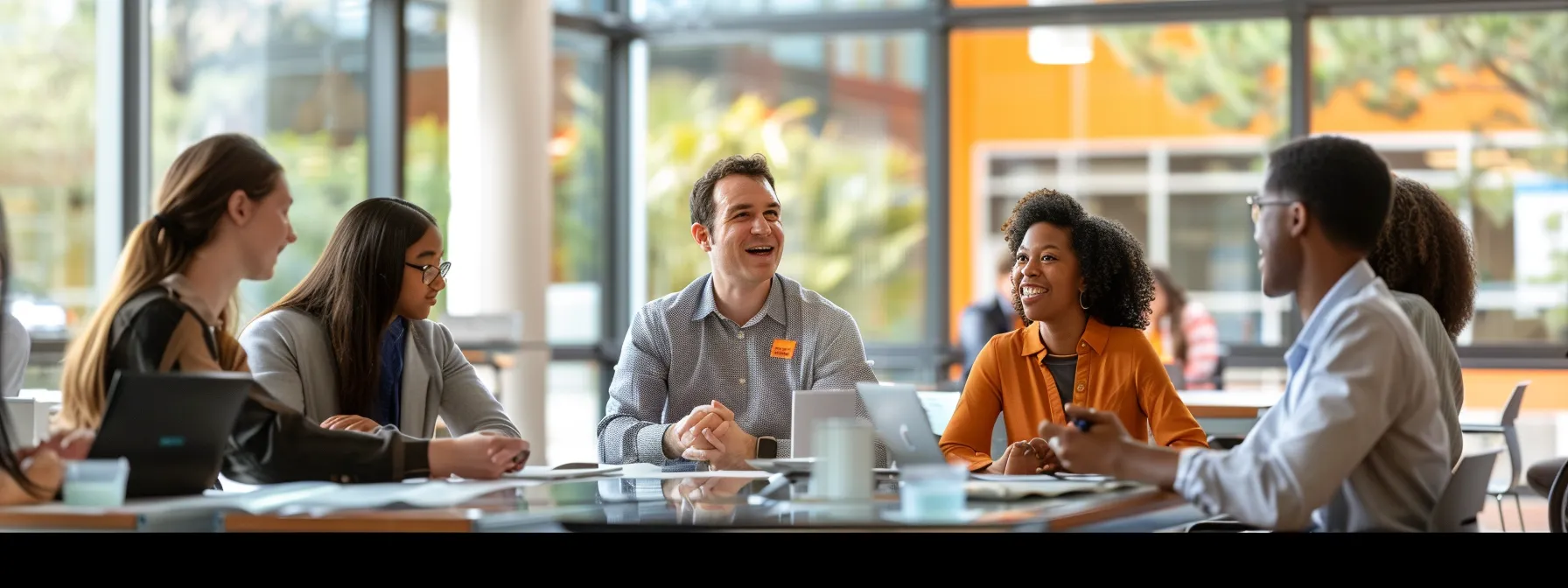 a group of professionals discussing leadership qualities and service projects tied to middle school honor society.